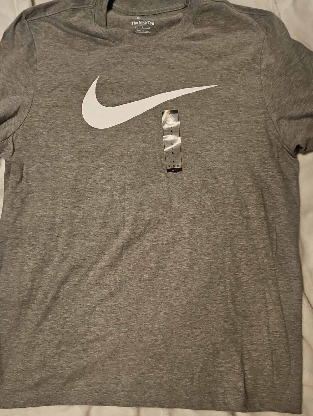 Nike Gray Tee with White Swoosh Logo